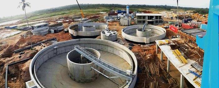 Circular treatment tanks at the Akim Oda Water Project